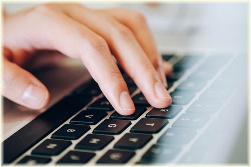 fingers on keyboard